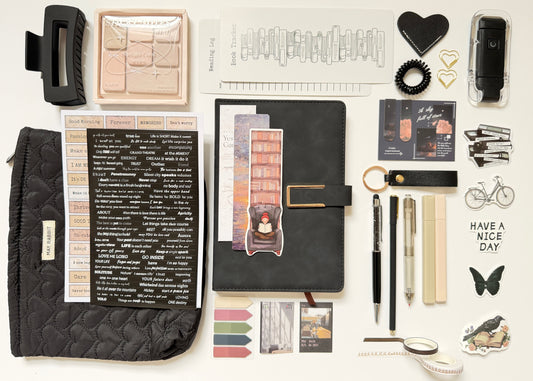 Black stationery gift box with notebook, pens and desk accessories