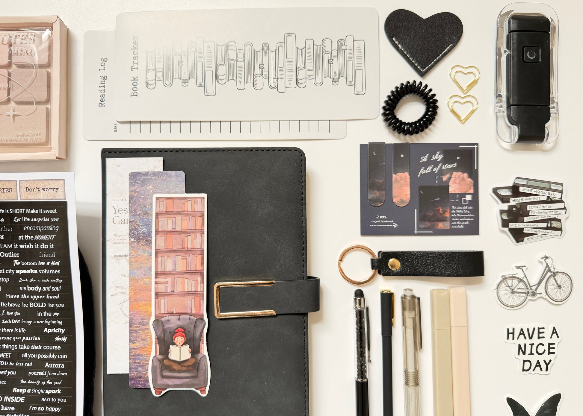 Black stationery gift box with notebook, pens and desk accessories