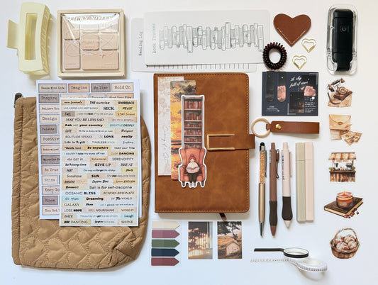 brown stationery gift box with notebook, pens and desk accessories