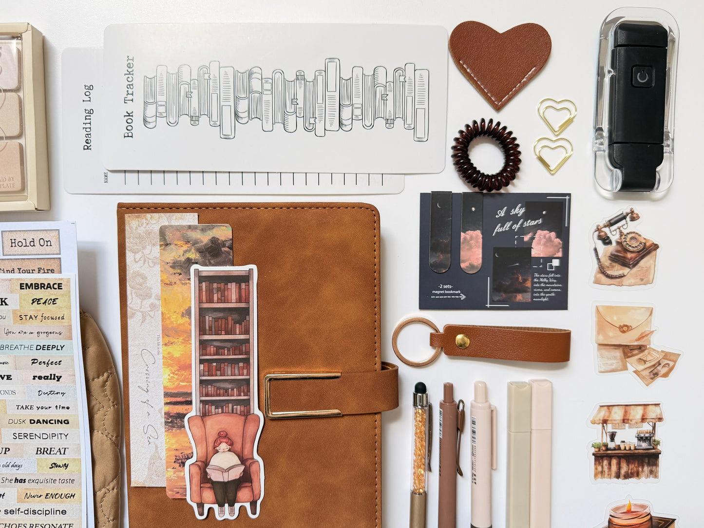 brown stationery gift box with notebook, pens and desk accessories